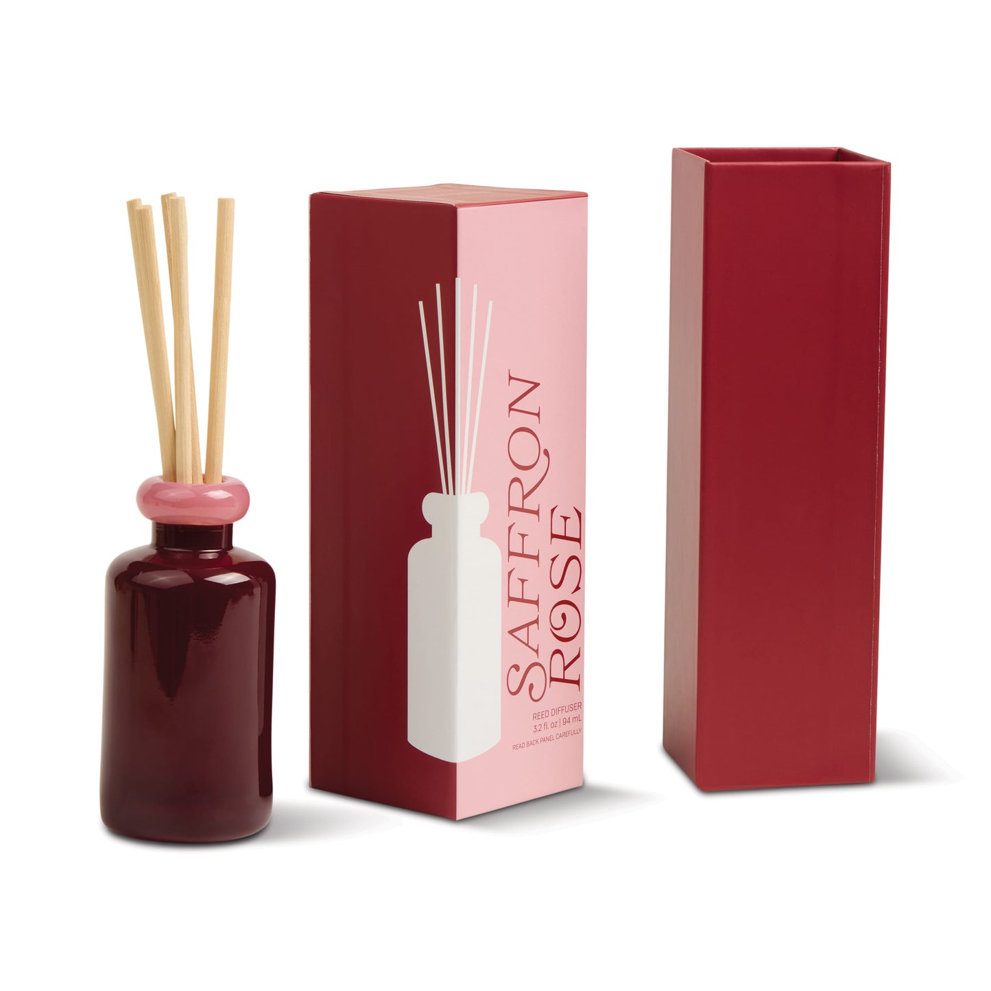 The Saffron Rose - Stack 3.2 oz Diffuser, featuring four wooden reeds, sits beside its red and pink box and an upright red rectangular lid, providing modern decor and a lasting floral fragrance.