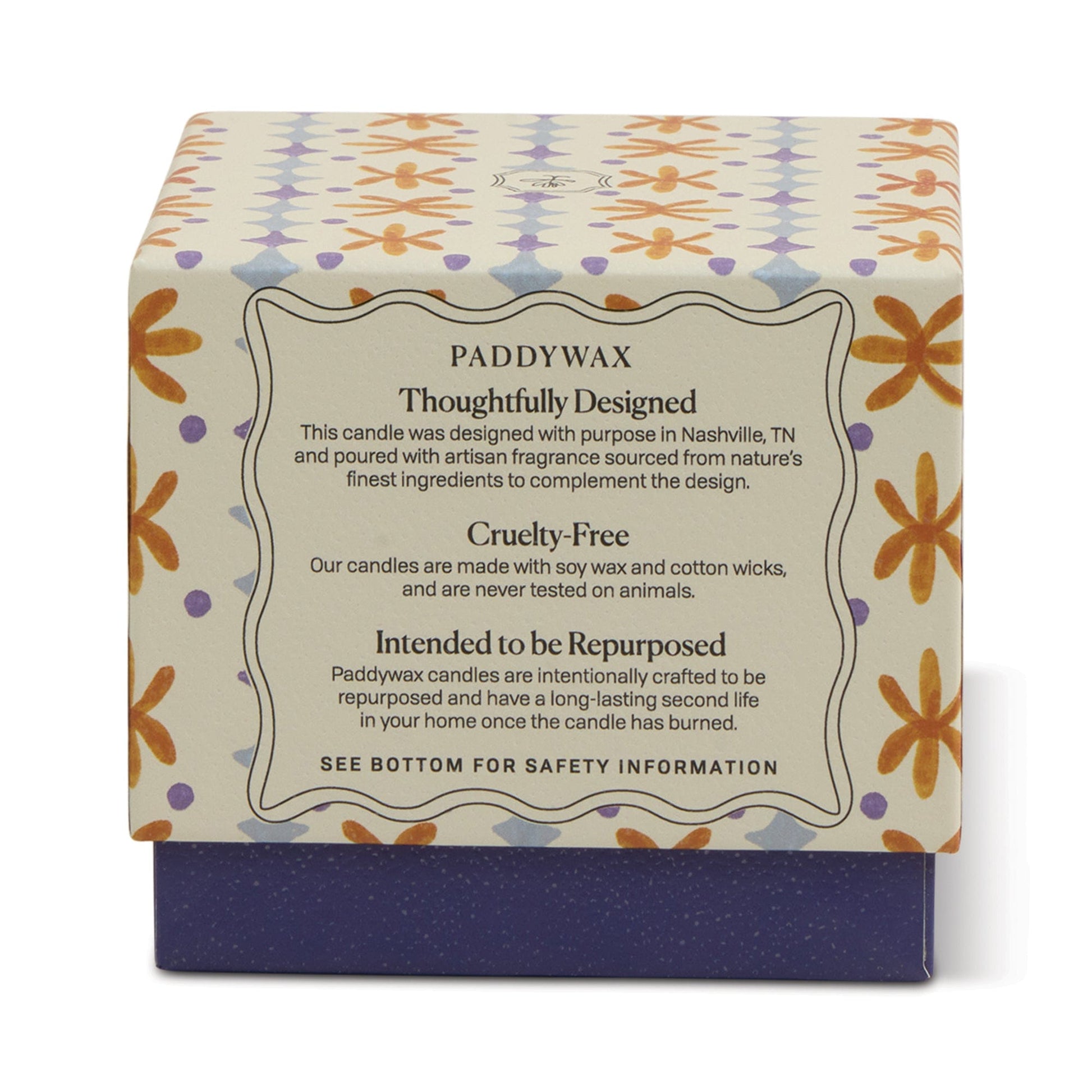 The Garden & Grove - Tulip 5.5 oz Candle comes in a decorative box with floral patterns and a label: Paddywax – Thoughtfully Designed, Cruelty-Free, Intended to be Repurposed. Ideal for garden-inspired home decor; includes product and safety info.