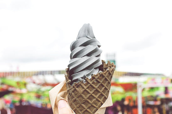 Charcoal ice cream in waffle cone