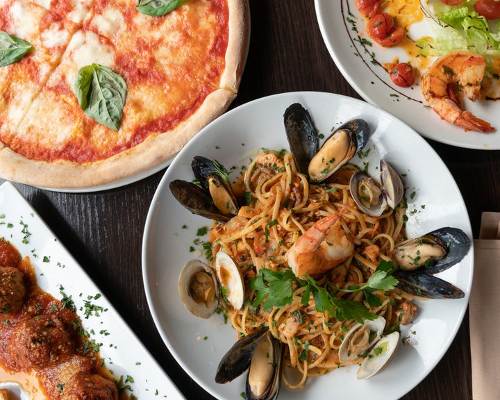 Shellfish with pasta surrounded by other foods
