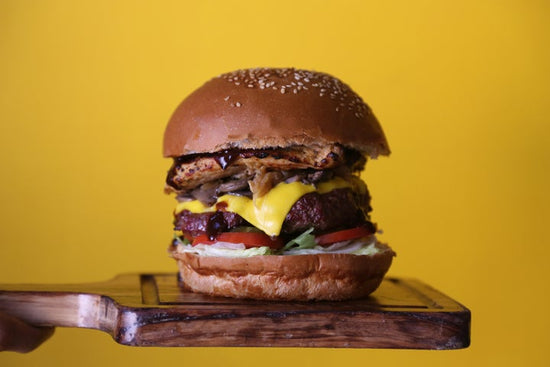 Burger on wooden platter