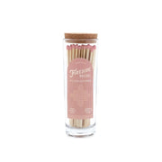Fireside Safety Matches - Blush: A clear glass match bottle filled with wooden pink-tipped matches, topped with a cork lid. The soft pink and white label reads "Fireside Matches," making it the perfect candle companion.
