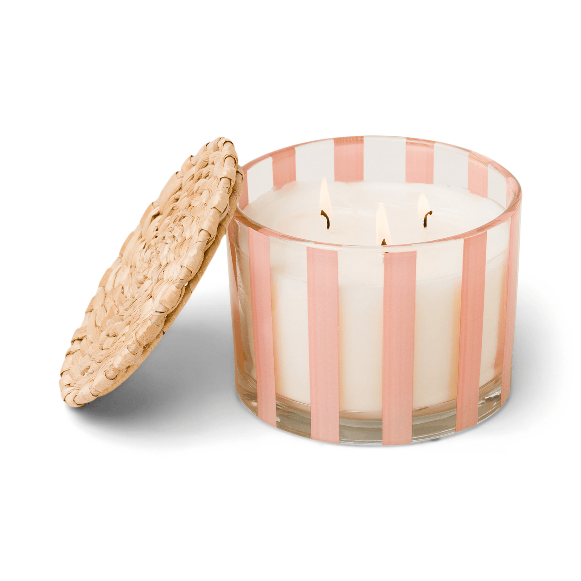 12 oz clear glass vessel with light pink stripes, white wax, and three wicks; a part of the Al Fresco collection; comes with woven rattan lid