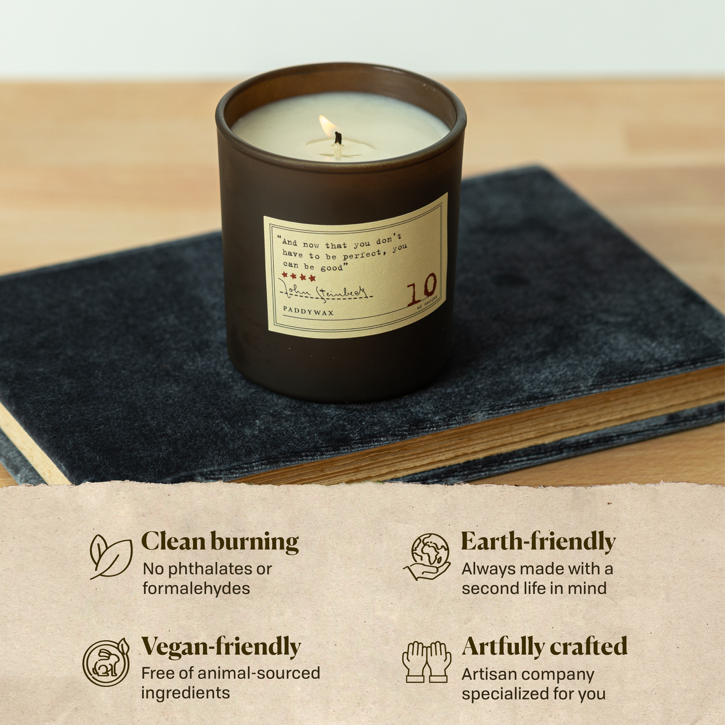 A photo of the John Steinbeck candle sitting on a book. Clean burning: no phthalates or formaldehydes. Earth-friendly: Always made with a second life in mind. Vegan-friendly: Free of animal sourced ingredients. Artfully crafted: Artisan company specialized for you.