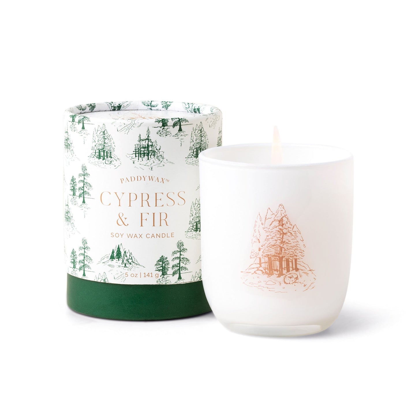 white opaque glass vessel with copper decal of fir trees; pictured next to white cylindrical candle holder with green fir trees on it