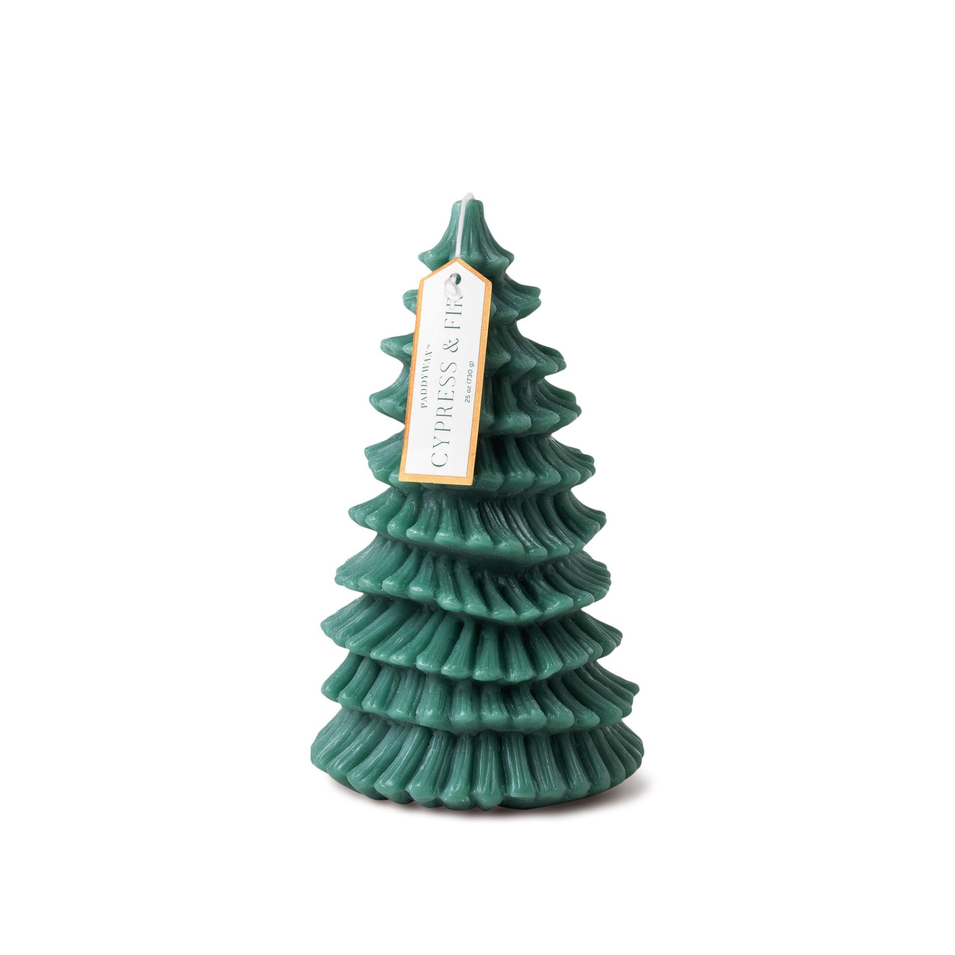 Small dark green candle in the shape of a fir tree; white and gold tag hanging from the top reads "Cypress & Fir"