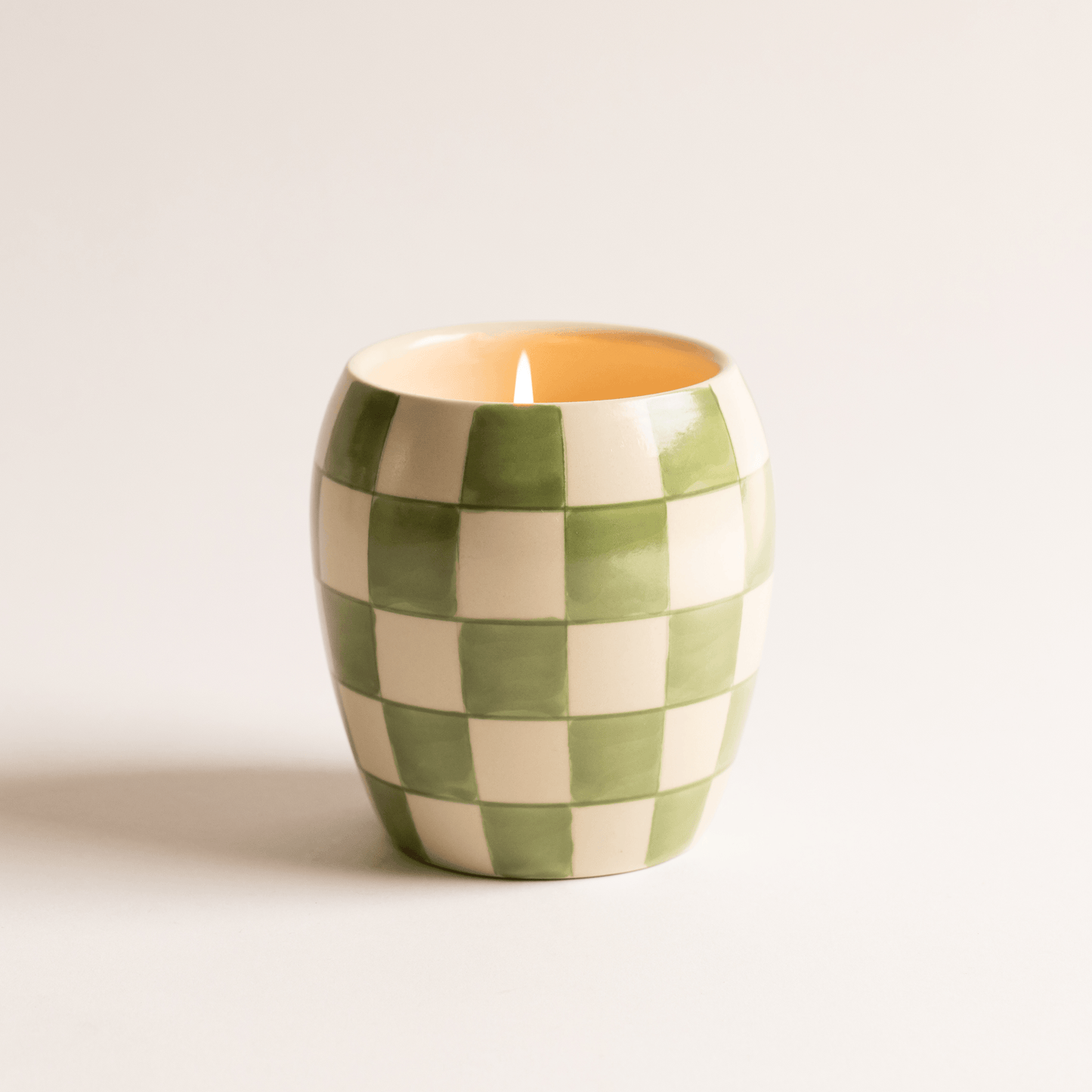 11 oz ceramic vessel with rounded cylindrical shape and a light green/white checker design; one cotton wick
