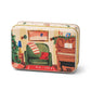 5 oz holiday tin with custom artwork; lid shows family room with piano and decorated tree