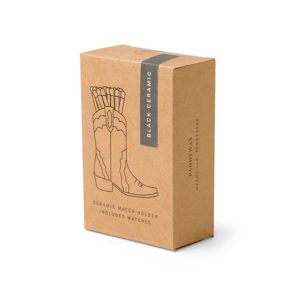 brown packaging with cowboy boot match holder outline on the front