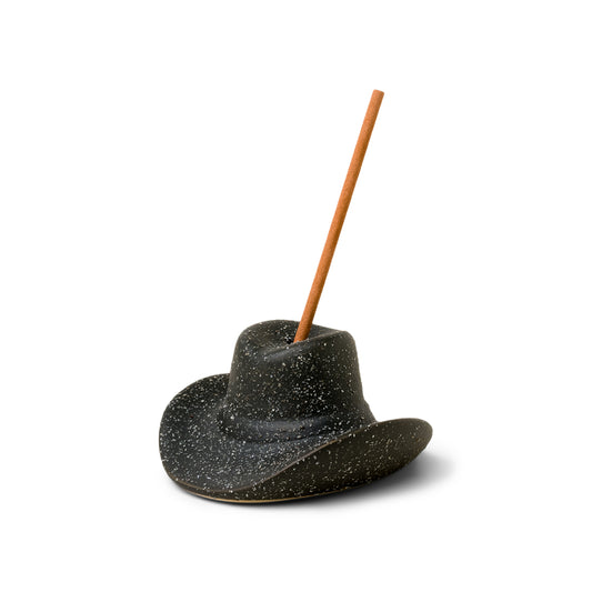 black ceramic cowboy hat holding incense stick in the top