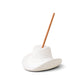 White ceramic cowboy hat holding incense stick in the top