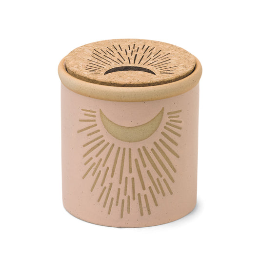 8 oz pink ceramic vessel with moon design and a cork lid (also containing the same design)