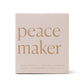 White box which reads "peace maker"; also has the number 9 printed on the side
