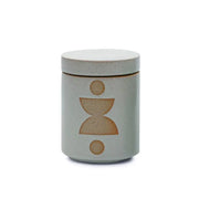 The Ocean Rose + Bay - Form 12 oz Candle comes in a ceramic jar with a lid, featuring a minimalist geometric pattern and natural speckled finish—ideal as a decorative accent or for adding fragrance to your home.
