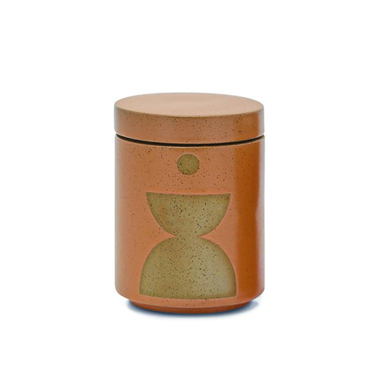 12 oz copper-colored cylindrical ceramic vessel with ceramic lid; white wax and two cotton wicks; reflected beige mirrored semi-circle design on the side