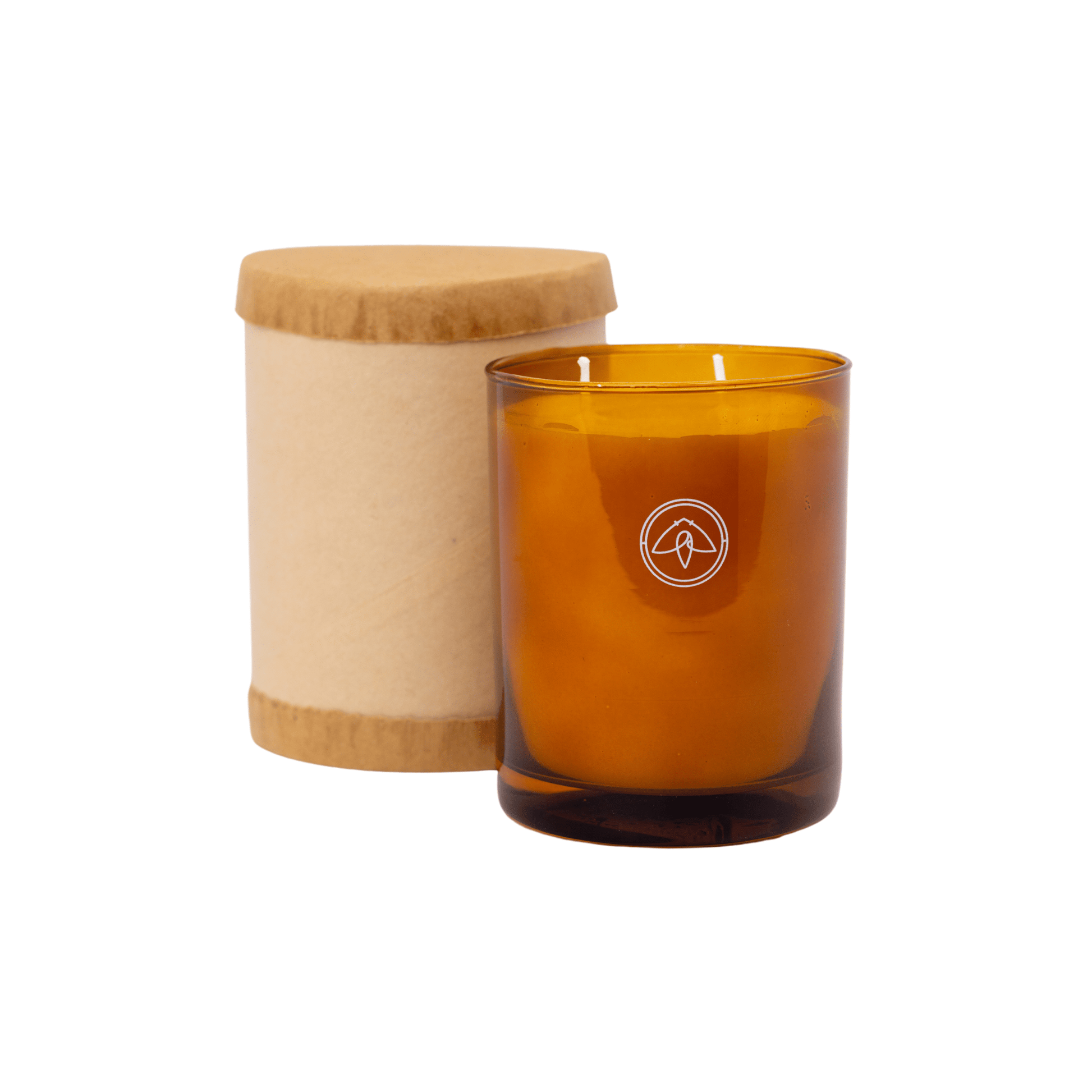 Glow candle next to packaging it arrives in