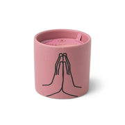 The Violet Vanilla "Thankful For You" 5.75 oz candle is a pink ceramic cup with a black graphic of two hands in prayer—making it a thoughtful gift choice.
