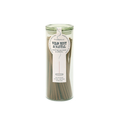 Green glass cylinder with white label holding 100 incense sticks for flameless fragrance