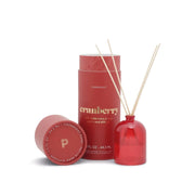 Gift-ready Cranberry - 1.5 oz Diffuser features a red glass reed diffuser with matching sticks in a stylish cylindrical box with an open lid—an ideal way to add scent and style to any space.