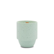 An Olympic - Parks 11 oz Candle, light green with speckled ceramic, features a rounded bottom and straight sides, reminiscent of national park designs, shown against a plain white background.