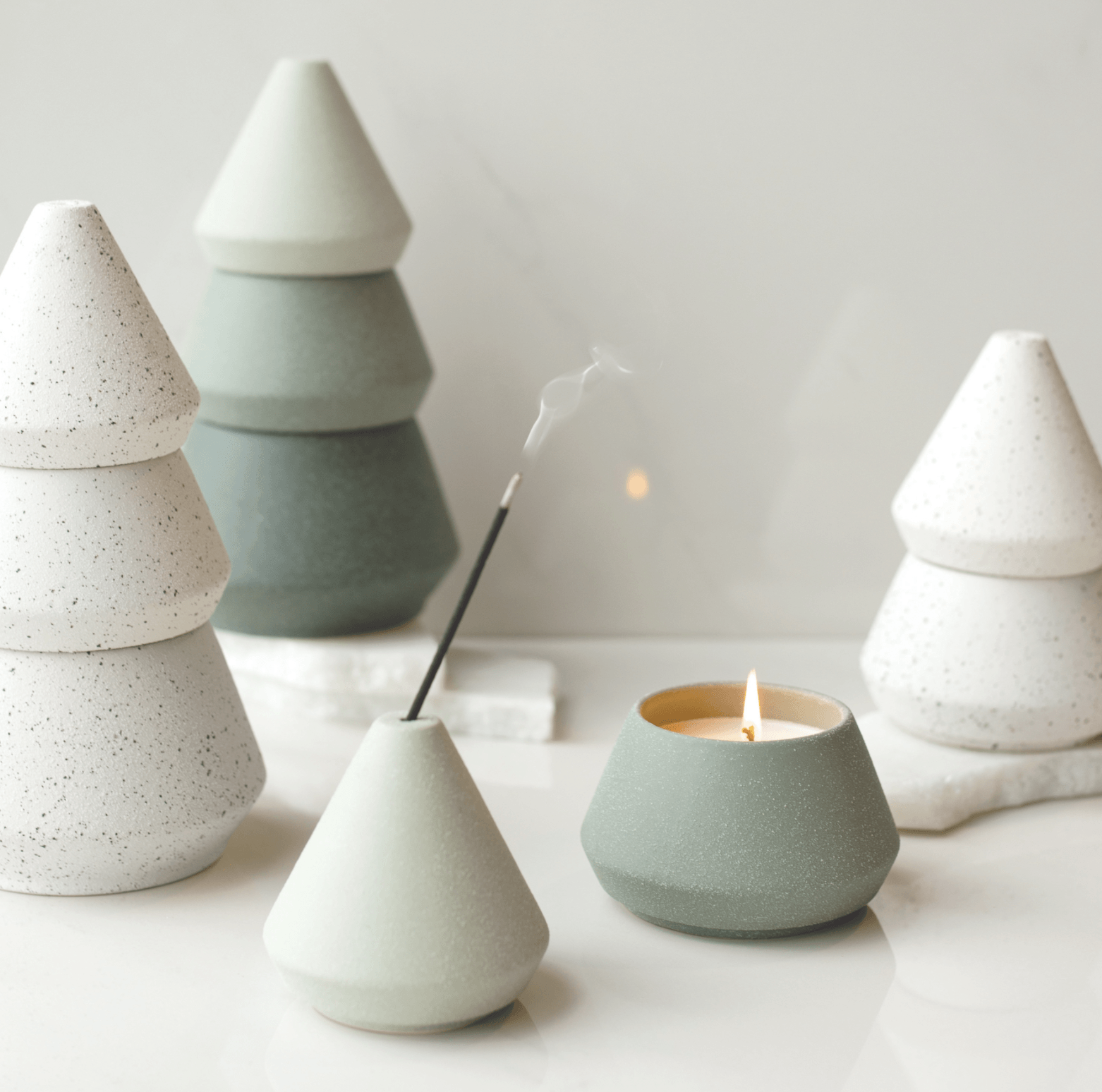 Large White Tree Stack with incense and a candle burning