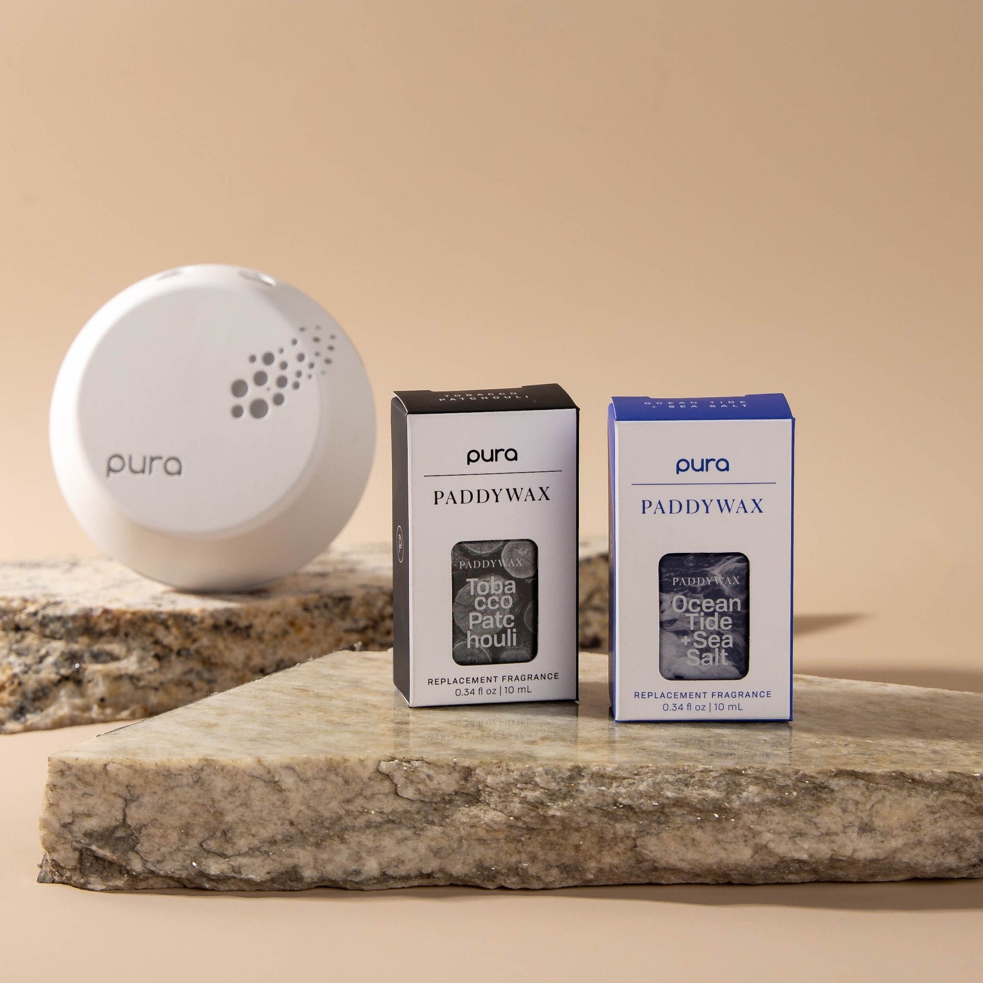 Pura Device with Paddywax Tobacca Patchouli and Ocean Tide Sea Salt fragrance refills