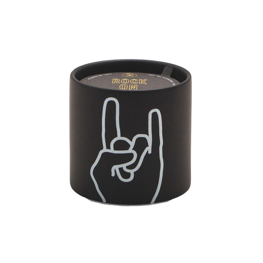 Impressions 5.75 oz Candle - Leather + Oakmoss "Rock On" - black colored vessel with a white outlined hand symbolizing rock on