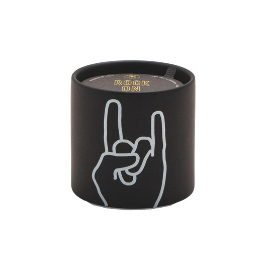 Impressions 5.75 oz Candle - Leather + Oakmoss "Rock On" - black colored vessel with a white outlined hand symbolizing rock on